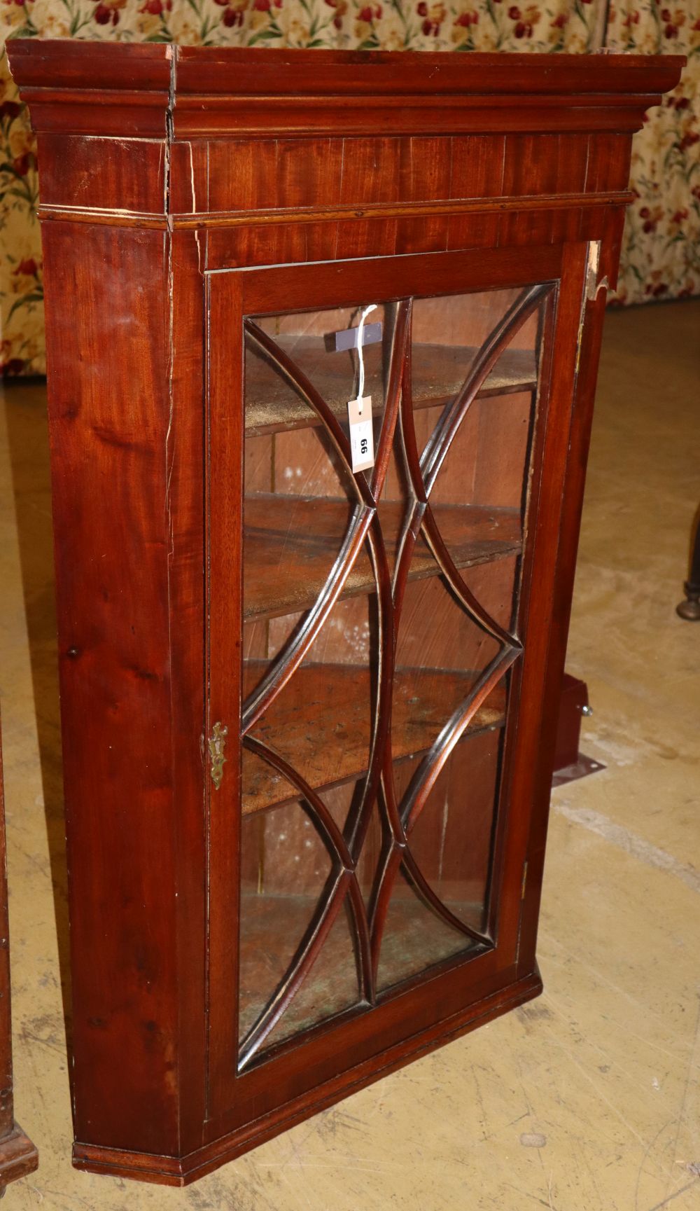 A George III glazed mahogany hanging corner cupboard, W.74cm, D.44cm, H.116cm